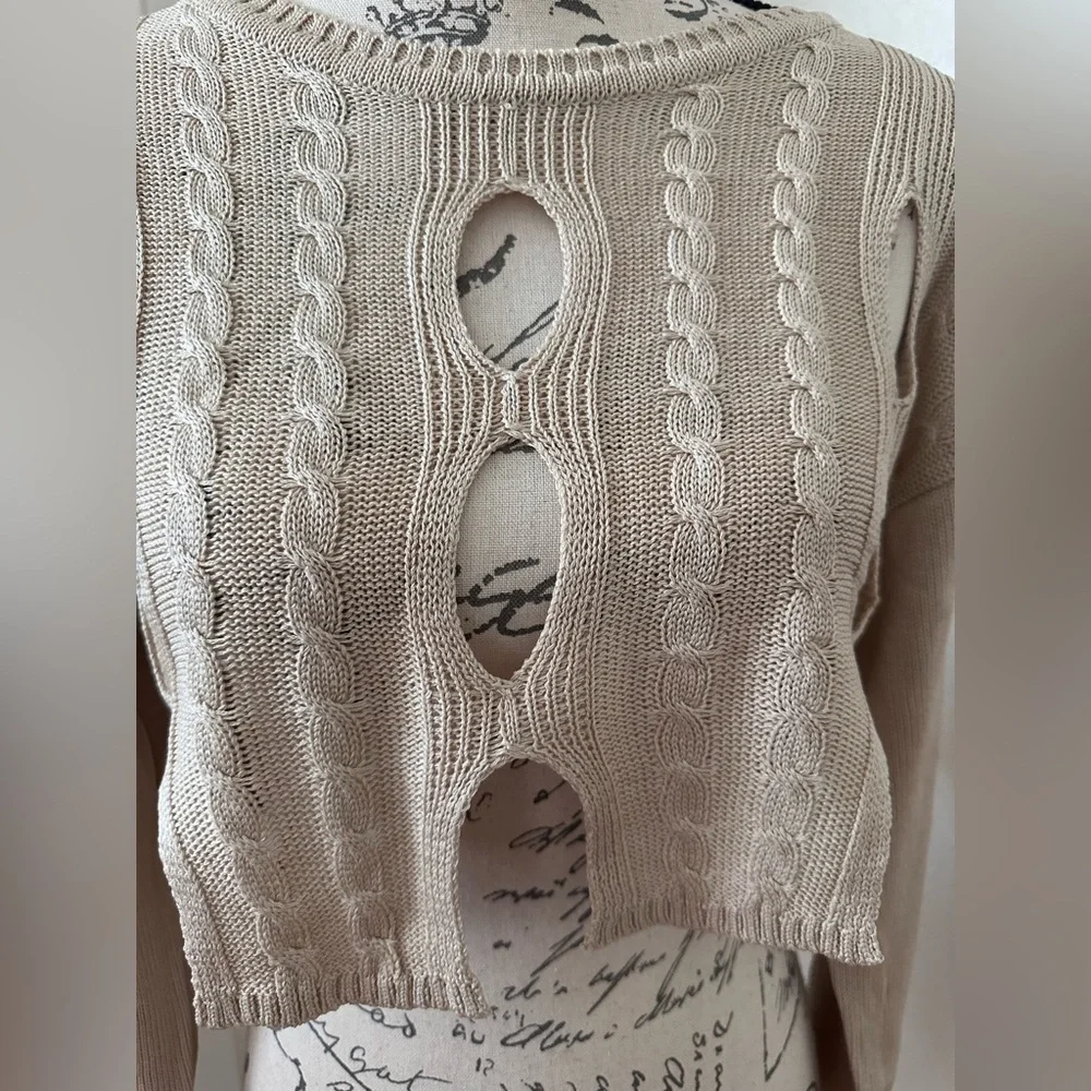 The LA cream and ur luv seoul ripped knitted crop top